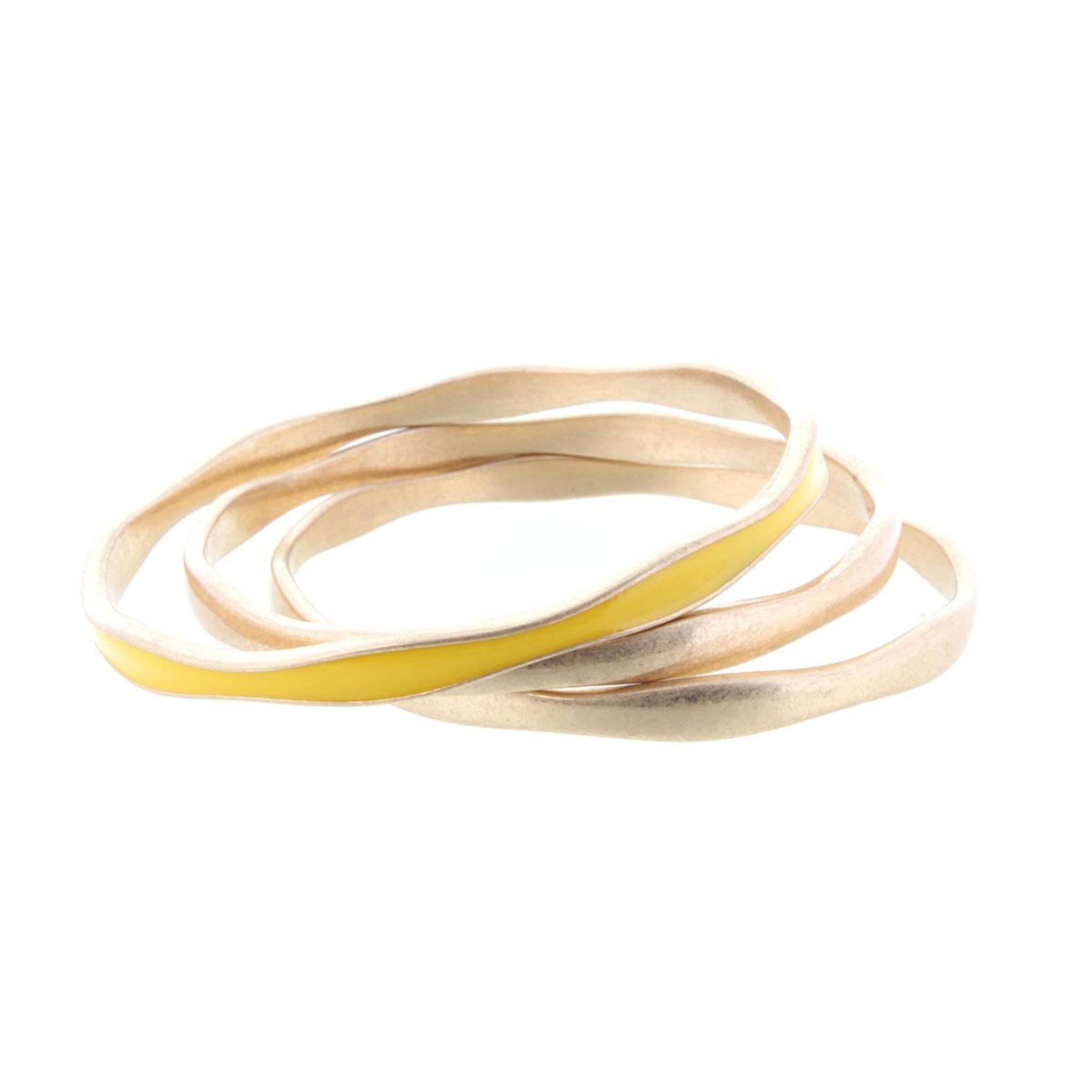 3 Gold Wavy Bangle Bracelets with One Yellow Epoxy Accent
